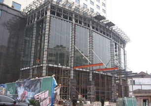全玻璃幕墙安装施工全流程解析 从深化设计到竣工验收